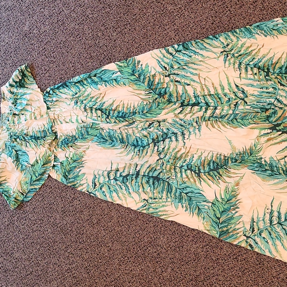 Brand new with tags long, flowy, floral, strapless, asymmetrical dress.
